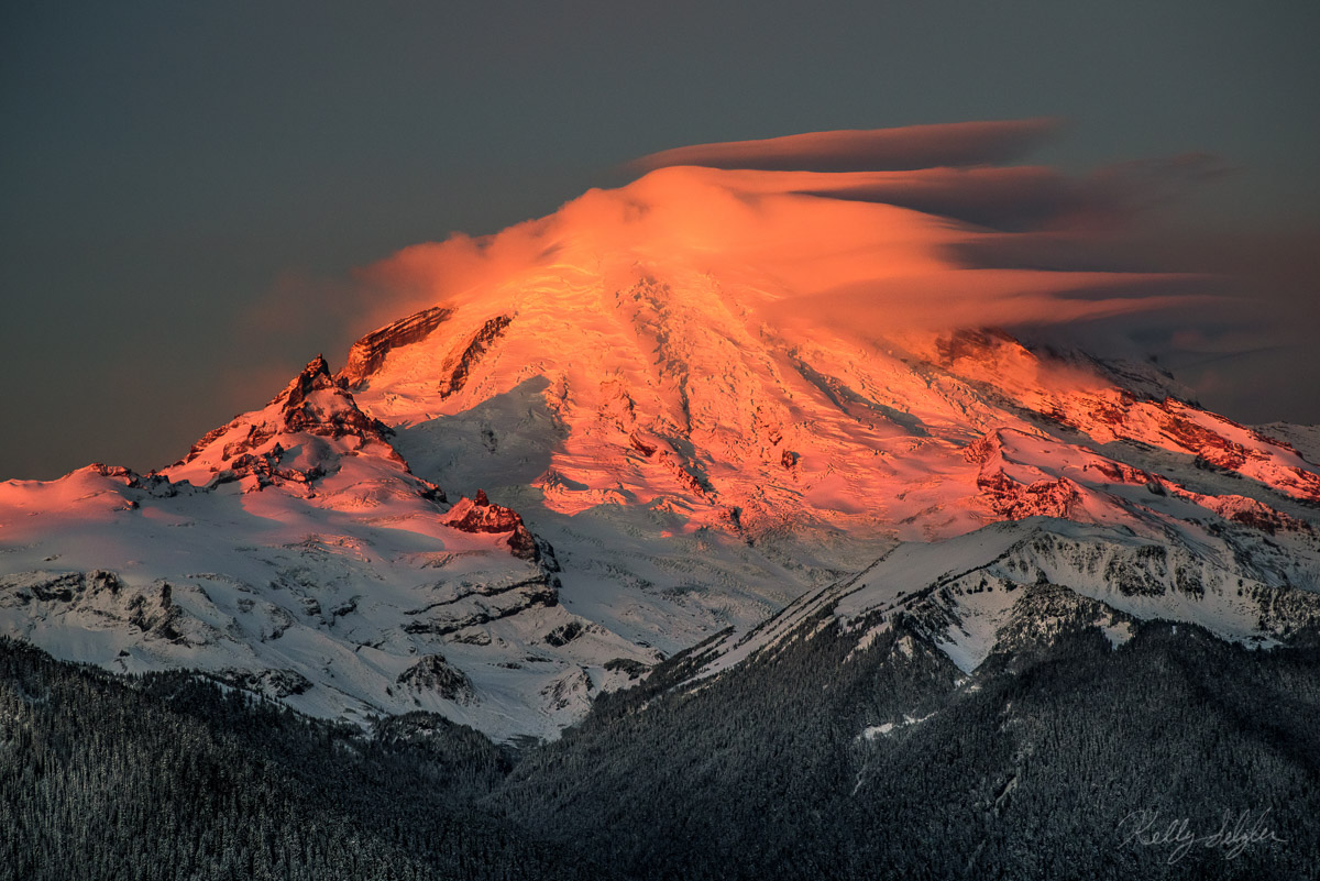 An early season snow in the Cascades Mountains of Washington led to a great sunrise capture of Mt. Rainier. Hiking up the Crystal...