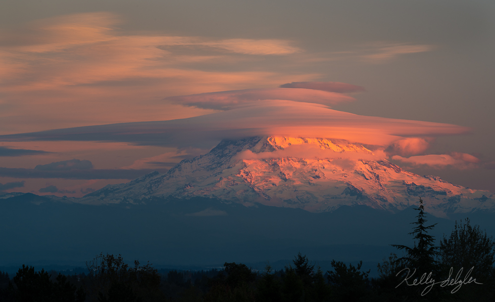 An unforgettable sunset of Mt. Rainier taken from my neighborhood.